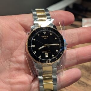 Tissot Seastar Black Dial with Two Tone Bracelet